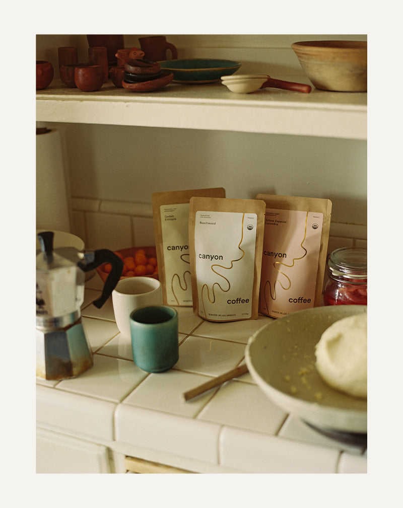 Bags of Canyon Coffee on a counter
